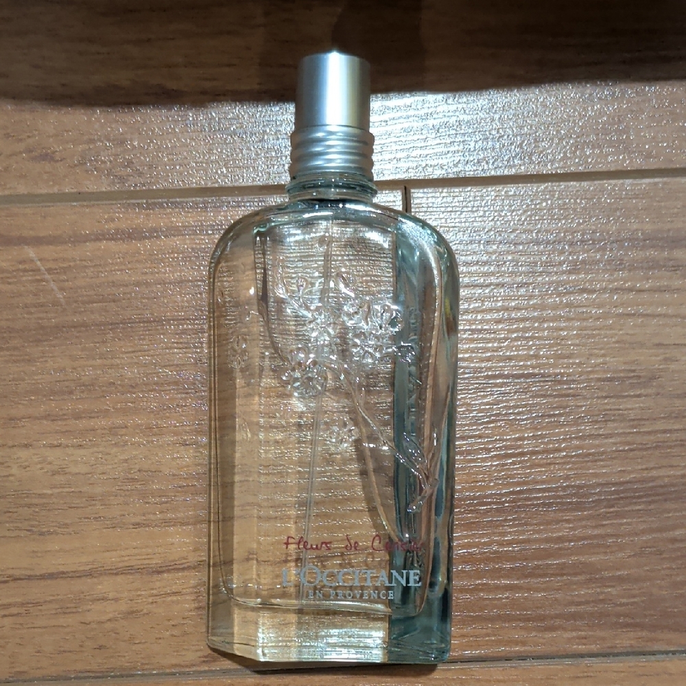 102 - L'OCCITANE Clear Body Oil with Silver Cap NO BOX